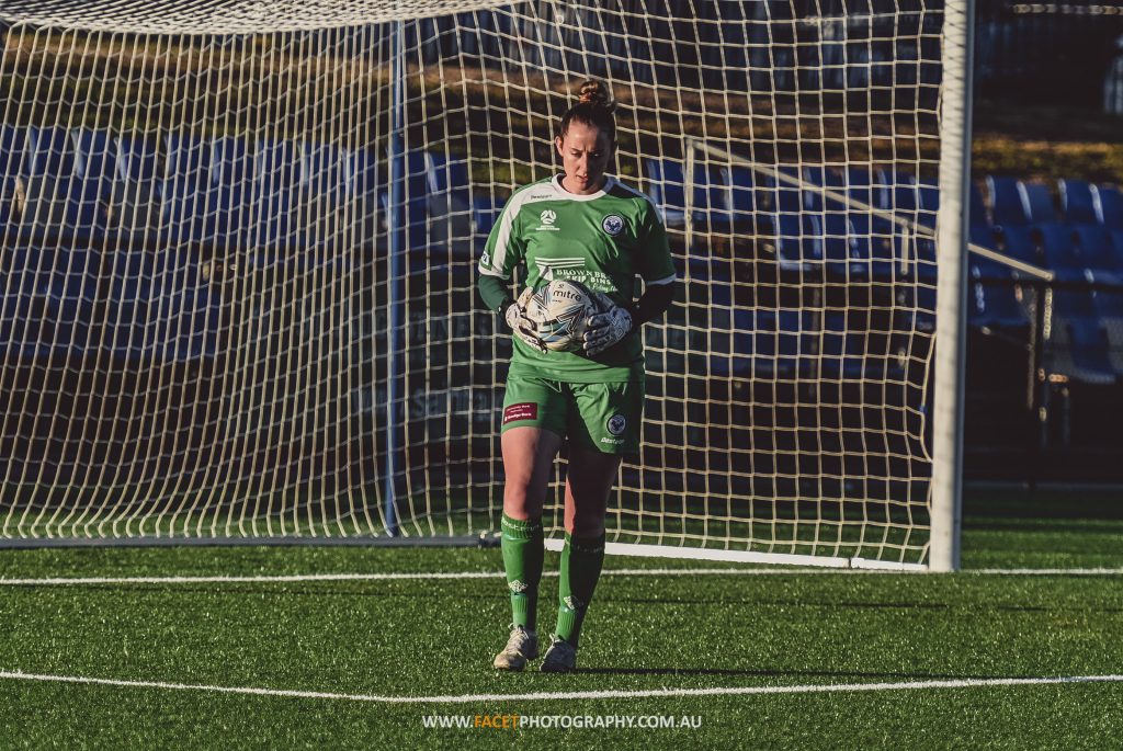 Manly United goalkeeper Nicole Simonsen prepares for a goal kick during a 2022 NPL NSW Women's game. Photo credit: Jeremy Denham