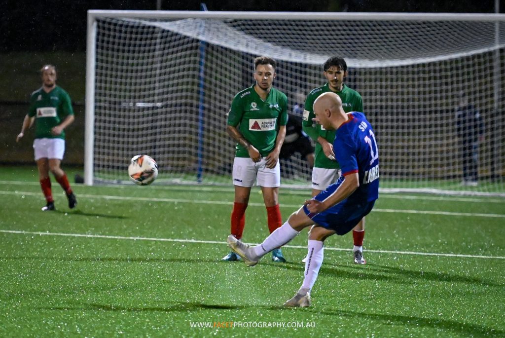 Matt Sim of Manly United takes a free kick during a 2022 NPL NSW Men's game against Marconi Stallions. Photo credit: Jeremy Denham