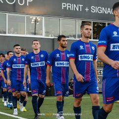 Manly United walk onto the field ahead of their 2022 NPL NSW Men's game against APIA Leichhardt at Lambert Park. Photo credit: Jeremy Denham