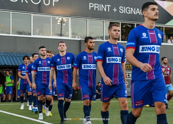 Manly United walk onto the field ahead of their 2022 NPL NSW Men's game against APIA Leichhardt at Lambert Park. Photo credit: Jeremy Denham