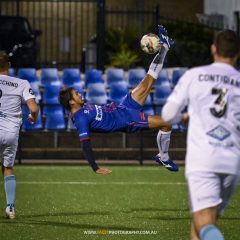 Bruno Mendes scores with a bicycle kick during the Round 14 NPL NSW Men's game between Manly United and Sutherland Sharks in 2022. Photo credit: Jeremy Denham