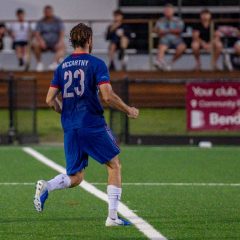 Action shot of Harry McCarthy during the 2023 NPL NSW Men's Round 2 game between Manly United and Sydney Olympic. Photo credit: Jeremy Denham