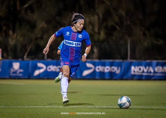 Seiya Kambayashi runs with the ball during the 2023 NPL NSW Men's Round 19 game between Sydney FC and Manly United. Photo credit: Jeremy Denham