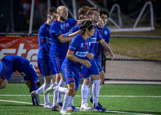 Manly United celebrate Harry McCarthy's goal during their 2023 NPL NSW Men's Round 23 game against Marconi Stallions. Photo credit: Jeremy Denham