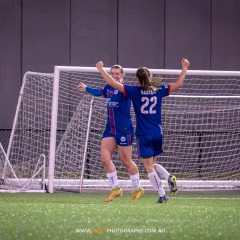 Kahli Johnson celebrates her goal with Emily Bastow, during the 2023 NPL NSW Women's Round 18 game between Manly United and APIA Leichhardt at Cromer Park. Photo credit: Jeremy Denham