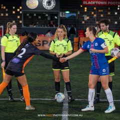 Chantelle Maniti (left) and Ruby Jackson (right) shake hands before the 2023 NPL NSW Women's Round 13 game between Blacktown Spartans and Manly United at Blacktown Football Park. Photo credit: Jeremy Denham