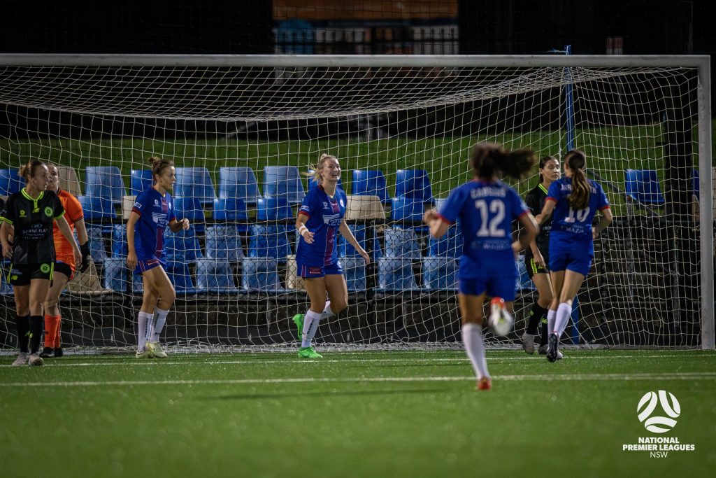 Gemma Woolley celebrates scoring Manly United's 2nd goal in their 3-0 victory over Sydney Olympic, which took them to 1st place in NPL Women's NSW. Photo credit: Jeremy Denham for Football NSW