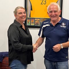 New Manly Warringah FA / Manly United FC CEO Vicki Halpin shakes hands with MWFA Chairman David Wilson.